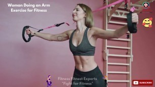 'A Woman Doing an Arm Exercise for Fitness - Fitness Fitnest Experts - Fight for Fitness'