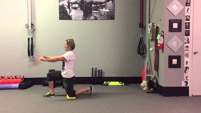 'Band Pull-Aparts - Half-Kneeling  | Rippel Effect Fitness'