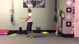 'Band Pull-Aparts in Staggered Stance | Rippel Effect Fitness'