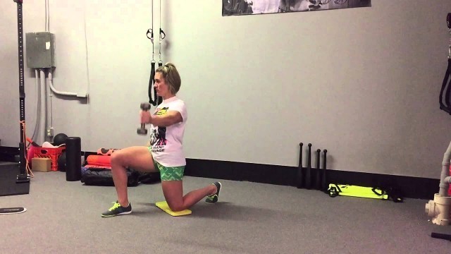 'DB Scaption - Half-Kneeling | Rippel Effect Fitness'