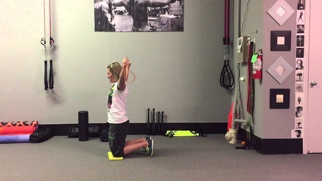 'Band Pull-Aparts - Tall-Kneeling Vertical | Rippel Effect Fitness'