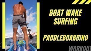 'Boat wake surfing w/ Paddleboard'