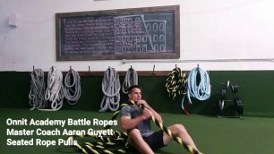 'Seated Rope Pulls Battle Ropes Exercise'