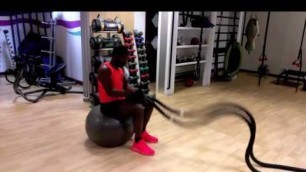 'Stability Training - Battle Ropes, seated on a Bosu Ball'