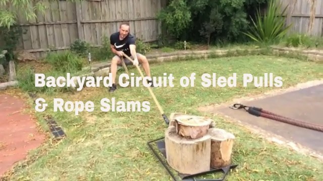 'Backyard Circuit Workout with Sled Pull, Battling Ropes & Wood Splitter'