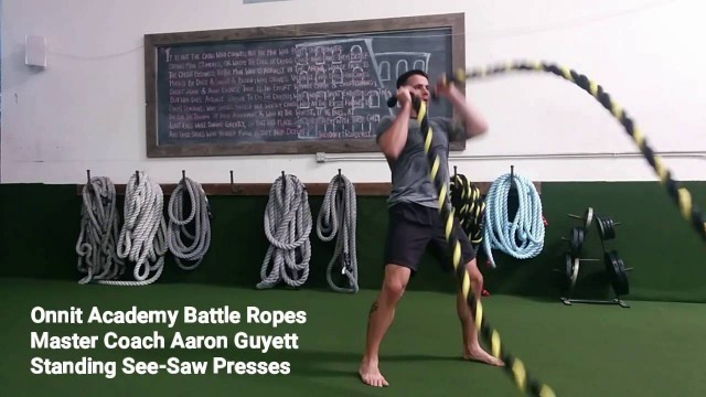 'See-Saw Presses Battle Ropes Exercise'