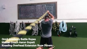 'Kneeling Overhead Extension Rope Drivers Battle Ropes Exercise'