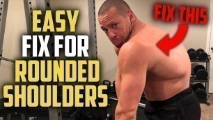 'How to Fix Rounded Shoulders with ONE Simple Movement | Tiger Fitness'