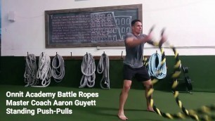 'Standing Push-Pulls Battle Ropes Exercise'