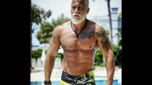 'Gym motivation | Bodybuilder with tattoo on body bodybuilder with long hair and beard, Pawel Ladziak'