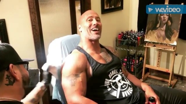 '\"The Rock\" Dwayne Johnson getting new tattoo, fixing the bull.'