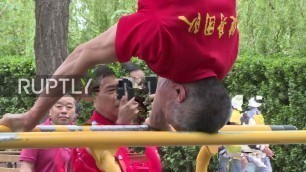 'You spin me right round Beijing - pensioners show off peak fitness and gymnastic skills'