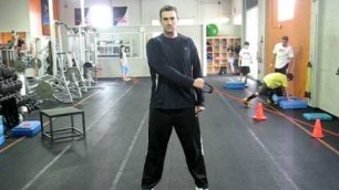 'Internal Rotation Squat with Cable or Resistance Band Lateral Raise - FUEL FITNESS'