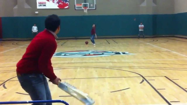 'GCC Playing Cricket In Gym'